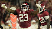 Sep 6, 2025; Tuscaloosa, Alabama, USA;  Alabama defensive lineman James Smith (23) celebrates after making a tackle for a loss against UL Monroe at Saban Field at Bryant-Denny Stadium. Mandatory Credit: Gary Cosby Jr.-Imagn Images