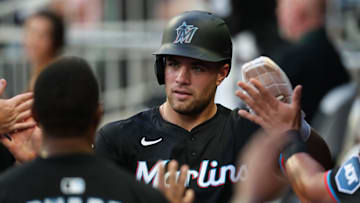 Aug 8, 2025; Cumberland, Georgia, USA; Miami Marlins center fielder Jakob Marsee (87) scores a run against the Atlanta Braves during the fourth inning at Truist Park. Mandatory Credit: Mady Mertens-Imagn Images