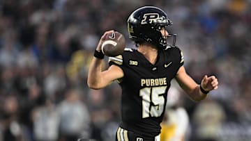 Purdue Boilermakers quarterback Ryan Browne (15) throws a pass
