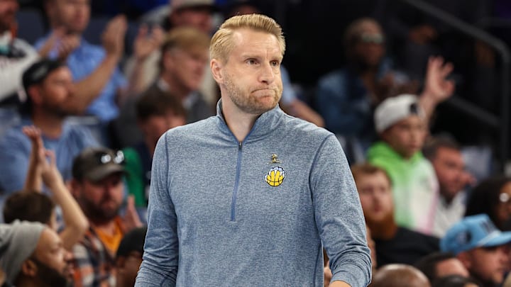 Nov 7, 2025; Memphis, Tennessee, USA;  Head coach Tuomas Iisalo watches from the sideline during the Grizzlies' NBA Cup victory against the Dallas Mavericks. 
