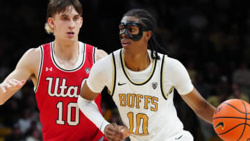 Feb 24, 2024; Boulder, Colorado, USA; Colorado Buffaloes forward Cody Williams (10) drives past Utah Utes forward Jake Wahlin (10) in the second half at the CU Events Center. Mandatory Credit: Ron Chenoy-USA TODAY Sports