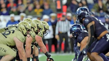 Dec 9, 2023; Foxborough, Massachusetts, USA; Army Black Knights offensive lineman Brady Small (51) lines up at the line of scrimmage against the Navy Midshipmen during the second half of the Army-Navy Game at Gillette Stadium. Mandatory Credit: Danny Wild-Imagn Images