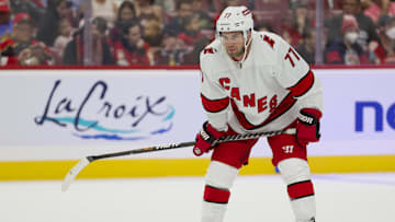 Sep 29, 2023; Sunrise, Florida, USA; Carolina Hurricanes defenseman Tony DeAngelo (77) looks on against the Florida Panthers during the first period at Amerant Bank Arena. Mandatory Credit: Sam Navarro-USA TODAY Sports