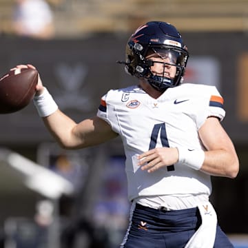 Nov 1, 2025; Berkeley, California, USA; Virginia Cavaliers quarterback Chandler Morris (4) warms up before the game against the California Golden Bears at California Memorial Stadium. Mandatory Credit: D. Ross Cameron-Imagn Images