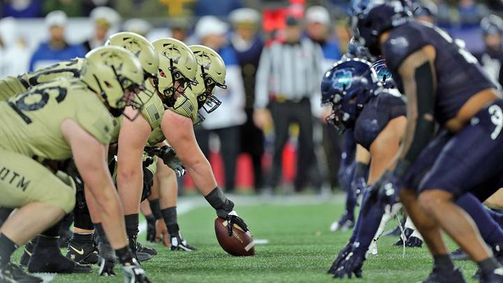 Dec 9, 2023; Foxborough, Massachusetts, USA; Army Black Knights offensive lineman Brady Small (51) lines up at the line of scrimmage against the Navy Midshipmen during the second half of the Army-Navy Game at Gillette Stadium. Mandatory Credit: Danny Wild-Imagn Images