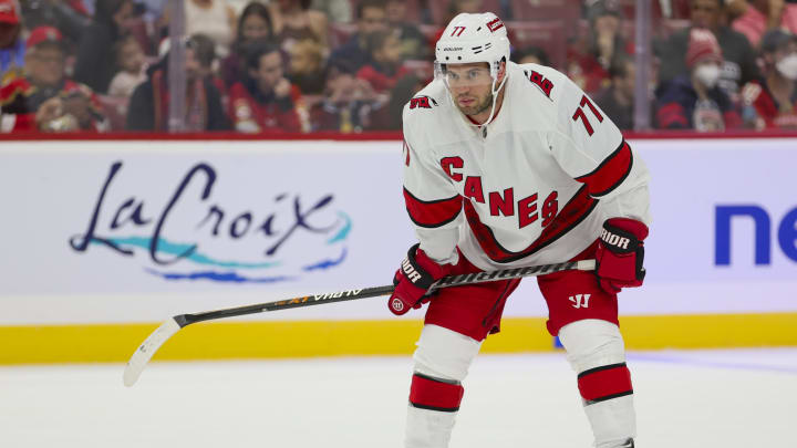 Sep 29, 2023; Sunrise, Florida, USA; Carolina Hurricanes defenseman Tony DeAngelo (77) looks on against the Florida Panthers during the first period at Amerant Bank Arena. Mandatory Credit: Sam Navarro-USA TODAY Sports