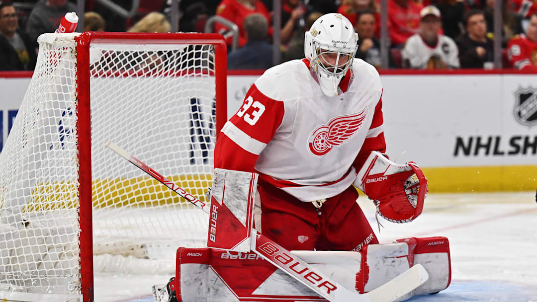 Oct 1, 2022; Chicago, Illinois, USA;  Detroit Red Wings goaltender Sebastian Cossa (33) defends the net against the Chicago Blackhawks at United Center. Mandatory Credit: Jamie Sabau-Imagn Images