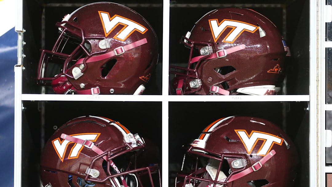 Nov 21, 2020; Pittsburgh, Penn.;  Helmets inside the Virginia Tech equipment trunk on the sidelines against Pitt.