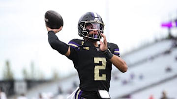 Oct 10, 2025; Seattle, Washington, USA; Washington Huskies quarterback Demond Williams Jr. (2) warms up before the game against the Rutgers Scarlet Knights  at Husky Stadium. Mandatory Credit: Kevin Ng-Imagn Images