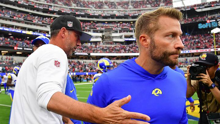 San Francisco 49ers head coach Kyle Shanahan meets with Los Angeles Rams head coach Sean McVay