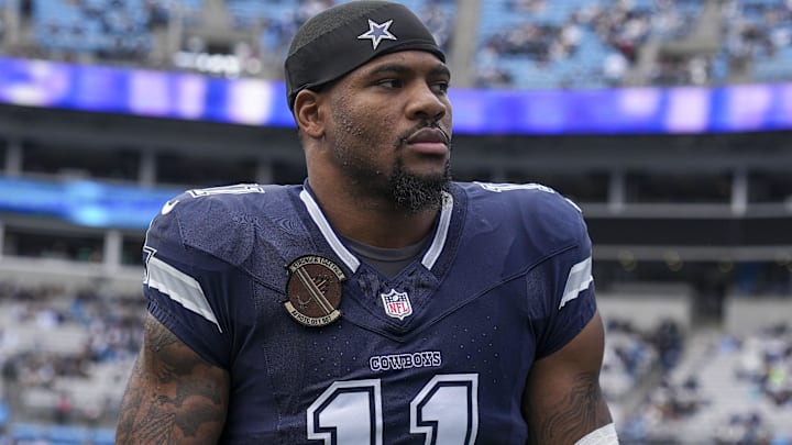 Dec 15, 2024; Charlotte, North Carolina, USA; Dallas Cowboys linebacker Micah Parsons (11) walks onto the field during the first quarter against the Carolina Panthers at Bank of America Stadium. Mandatory Credit: Jim Dedmon-Imagn Images