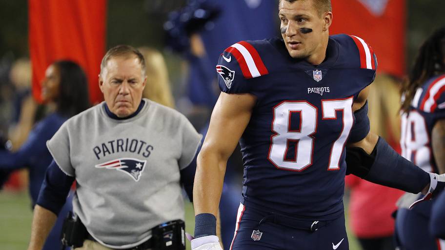 Bill Belichick and Rob Gronkowski on the Patriots sideline.
