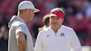 Nov 26, 2022; Athens, Georgia, USA; Georgia Bulldogs head coach Kirby Smart (right) talks to Georgia Tech Yellow Jackets interim head coach Brent Key prior to the game at Sanford Stadium. Mandatory Credit: Dale Zanine-Imagn Images