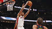Miami Heat center Kel'el Ware (7) controls a rebound against the Atlanta Hawks during the first half at State Farm Arena.