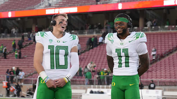 Oregon Ducks quarterback Bo Nix (10) and wide receiver Troy Franklin (11) are interviewed after defeating the Stanford Cardin