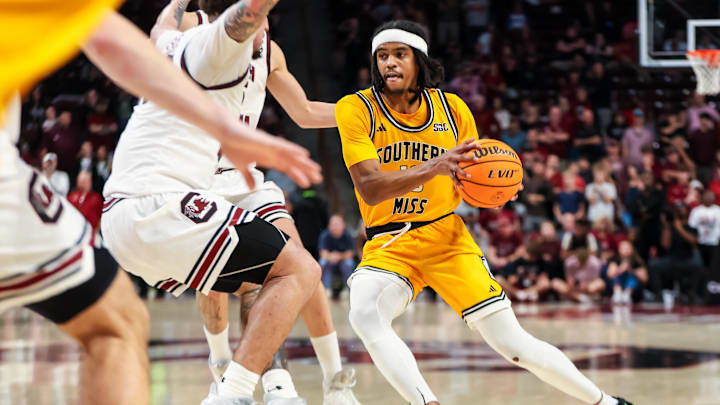 Nov 9, 2025; Columbia, South Carolina, USA; Southern Mississippi Golden Eagles guard Isaac Taveras (10) drives against the South Carolina Gamecocks in the second half at Colonial Life Arena. Mandatory Credit: Jeff Blake-Imagn Images