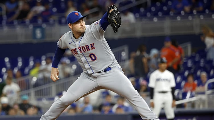 Sep 18, 2023; Miami, Florida, USA; New York Mets relief pitcher Adam Ottavino (0) pitches against the Miami Marlins during the ninth inning at loanDepot Park. Mandatory Credit: Rhona Wise-USA TODAY Sports