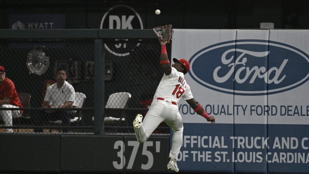 Sep 16, 2025; St. Louis, Missouri, USA; St. Louis Cardinals right fielder Jordan Walker (18) catches a fly ball hit by Cincinnati Reds second baseman Matt McLain (9) (not pictured) in the third inning at Busch Stadium. Mandatory Credit: Joe Puetz-Imagn Images