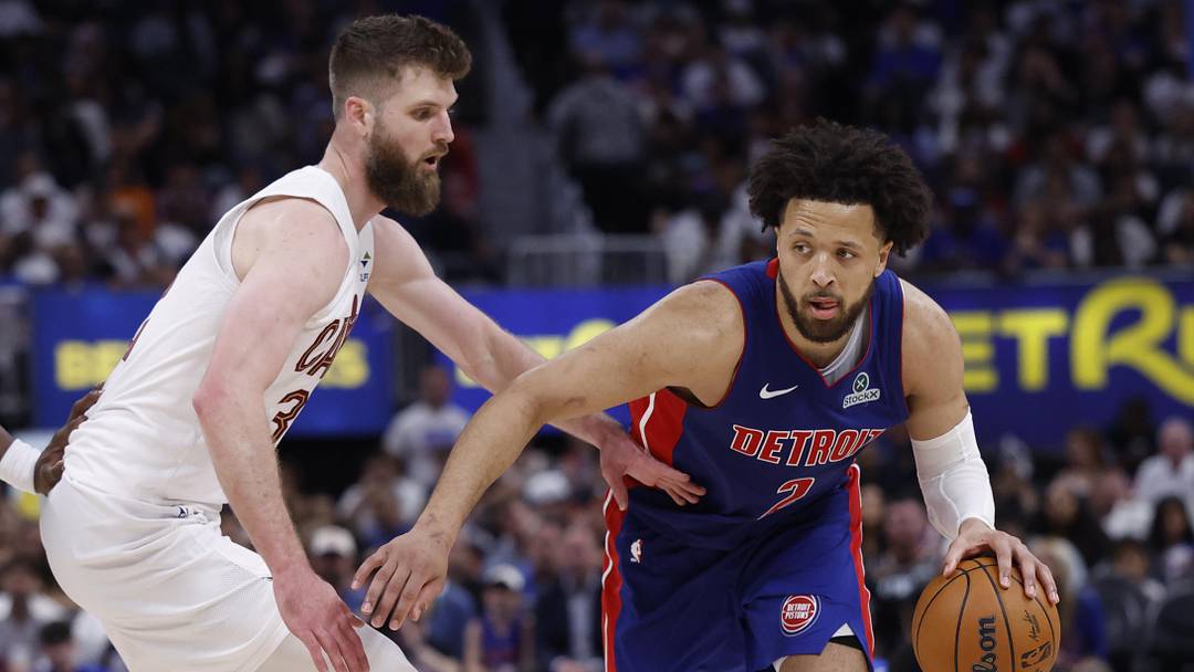 May 17, 2026; Detroit, Michigan, USA; Detroit Pistons guard Cade Cunningham (2) dribbles against Cleveland Cavaliers forward/center Dean Wade (32) in the second half during game seven of the second round of the 2026 NBA Playoffs at Little Caesars Arena. Mandatory Credit: Rick Osentoski-Imagn Images