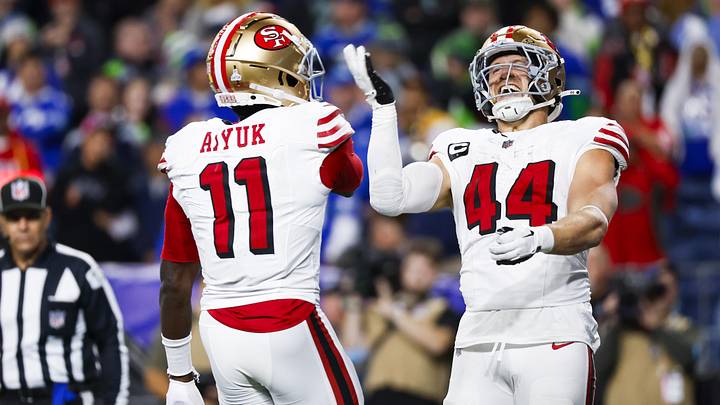 Oct 10, 2024; Seattle, Washington, USA; San Francisco 49ers fullback Kyle Juszczyk (44) celebrates with wide receiver Brandon Aiyuk (11) after rushing for a touchdown against the Seattle Seahawks at Lumen Field. Mandatory Credit: Joe Nicholson-Imagn Images