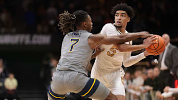 The Colorado Buffaloes men's basketball team showed resilience but fell 78-70 to No. 21 West Virginia on Sunday