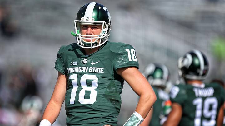 Sep 19, 2015; East Lansing, MI, USA; Michigan State Spartans quarterback Connor Cook (18) warms up prior to a game against Air Force at Spartan Stadium. Mandatory Credit: Mike Carter-Imagn Images