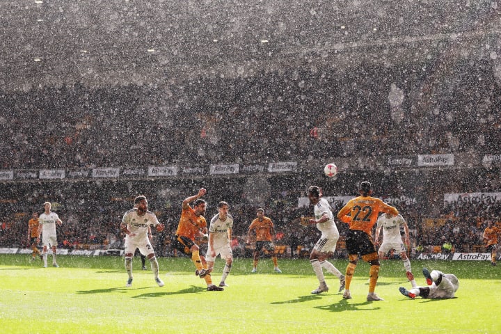 WOLVERHAMPTON, ENGLAND - MARCH 18: Ruben Neves of Wolverhampton Wanderers shoots during the Premier League match between Wolverhampton Wanderers and Leeds United at Molineux on March 18, 2023 in Wolverhampton, England. 
