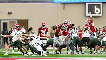 Oct 18, 2025; Bloomington, Indiana, USA; Indiana Hoosiers linebacker Kellan Wyatt (13) attempts to block a field goal during the second half against the Michigan State Spartans at Memorial Stadium. Mandatory Credit: Robert Goddin-Imagn Images