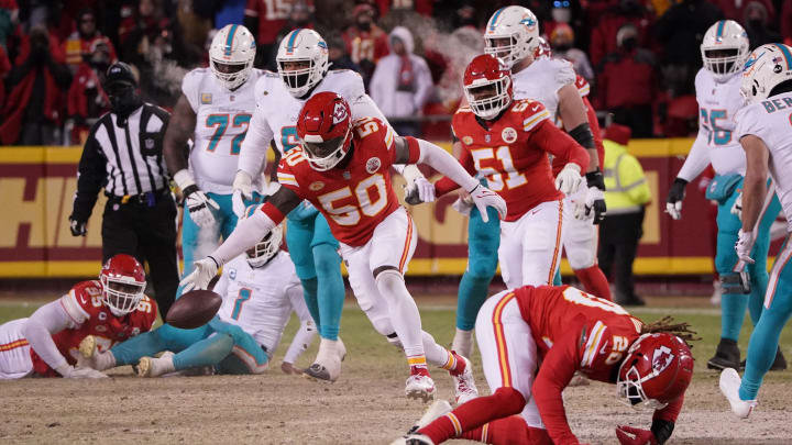 Kansas City Chiefs linebacker Willie Gay (50) moves in to recover the ball against the Miami Dolphins during the second half of the 2024 AFC wild card game at GEHA Field at Arrowhead Stadium. 