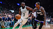 Jan 10, 2025; Boston, Massachusetts, USA; Boston Celtics guard Jaylen Brown (7) drives the ball against Sacramento Kings forward DeMar DeRozan (10) in the second half at TD Garden. Mandatory Credit: David Butler II-Imagn Images