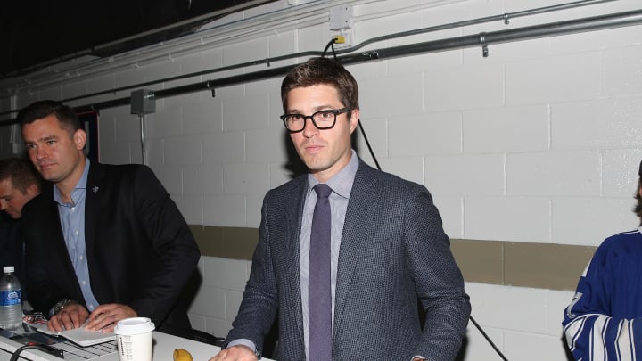 Sep 18, 2018; Lucan, Ontario, CAN; Toronto Maple Leafs general manager Kyle Dubas poses for a photo before their preseason game against the Ottawa Senators at Lucan Community Memorial Centre. The Maple Leafs beat the Senators 4-1. Mandatory Credit: Tom Szczerbowski-USA TODAY Sports