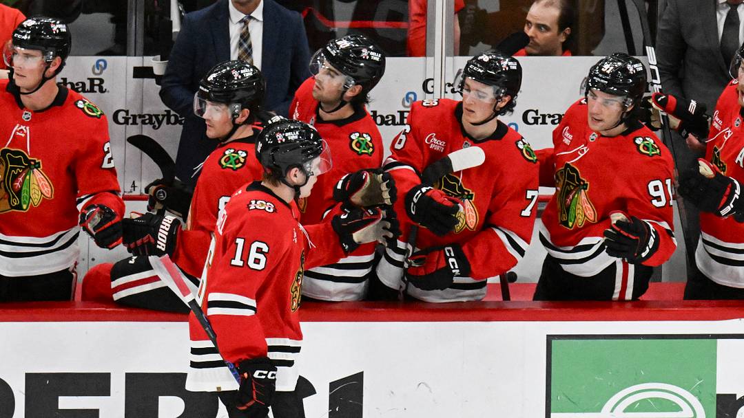 Apr 9, 2026; Chicago, Illinois, USA;  Chicago Blackhawks center Anton Frondell (16) celebrates his goal against the Carolina Hurricanes with teammates  during the third period at the United Center. Mandatory Credit: Matt Marton-Imagn Images