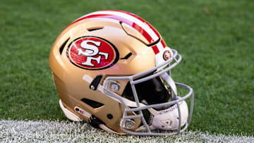 Jan 5, 2025; Glendale, Arizona, USA; Detailed view of a San Francisco 49ers helmet at State Farm Stadium. Mandatory Credit: Mark J. Rebilas-Imagn Images