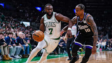 Jan 10, 2025; Boston, Massachusetts, USA; Boston Celtics guard Jaylen Brown (7) drives the ball against Sacramento Kings forward DeMar DeRozan (10) in the second half at TD Garden. Mandatory Credit: David Butler II-Imagn Images