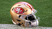 Jan 5, 2025; Glendale, Arizona, USA; Detailed view of a San Francisco 49ers helmet at State Farm Stadium. Mandatory Credit: Mark J. Rebilas-Imagn Images