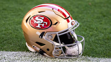 Jan 5, 2025; Glendale, Arizona, USA; Detailed view of a San Francisco 49ers helmet at State Farm Stadium. Mandatory Credit: Mark J. Rebilas-Imagn Images