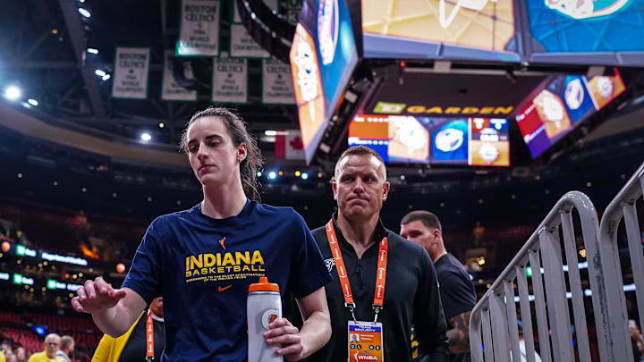 Indiana Fever guard Caitlin Clark exits the court after warm up before the start of the game against the Connecticut Sun.