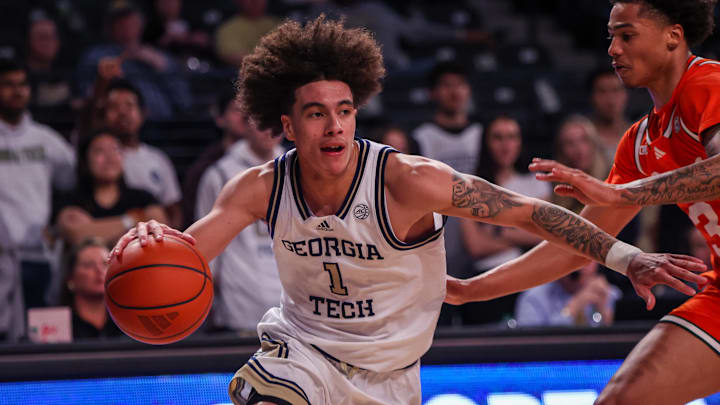 Mar 4, 2025; Atlanta, Georgia, USA; Georgia Tech Yellow Jackets guard Naithan George (1) drives to the basket against the Miami Hurricanes in the second half at McCamish Pavilion. Mandatory Credit: Brett Davis-Imagn Images
