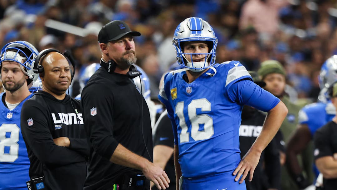 Nov 2, 2025; Detroit, Michigan, USA; Detroit Lions quarterback Jared Goff (16) speaks with head coach Dan Campbell in the first half against the Minnesota Vikings at Ford Field. Mandatory Credit: David Reginek-Imagn Images