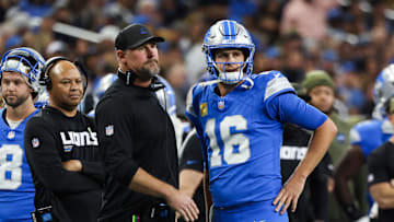 Nov 2, 2025; Detroit, Michigan, USA; Detroit Lions quarterback Jared Goff (16) speaks with head coach Dan Campbell in the first half against the Minnesota Vikings at Ford Field. Mandatory Credit: David Reginek-Imagn Images