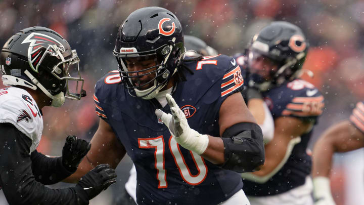 Dec 31, 2023; Chicago, Illinois, USA;  Chicago Bears offensive lineman Braxton Jones (70) blocks against the Atlanta Falcons at Soldier Field. Mandatory Credit: Jamie Sabau-USA TODAY Sports