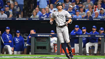 Oct 9, 2024; Kansas City, Missouri, USA; New York Yankees designated hitter Giancarlo Stanton (27) runs the bases after hiting a home run in the eighth inning against the Kansas City Royals during game three of the NLDS for the 2024 MLB Playoffs at Kauffman Stadium. Mandatory Credit: Peter Aiken-Imagn Images