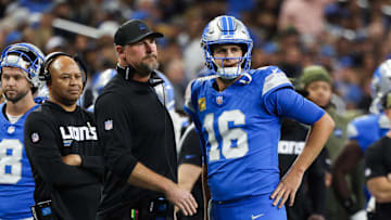 Nov 2, 2025; Detroit, Michigan, USA; Detroit Lions quarterback Jared Goff (16) speaks with head coach Dan Campbell in the first half against the Minnesota Vikings at Ford Field. Mandatory Credit: David Reginek-Imagn Images