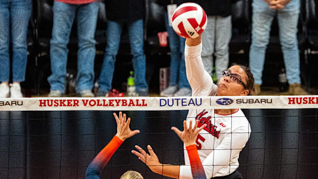 Nebraska Cornhuskers middle blocker Rebekah Allick (5) gets a kill to end the first set against the Illinois Fighting Illini 