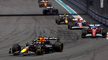 May 4, 2024; Miami Gardens, Florida, USA; Red Bull Racing driver Max Verstappen (1) lead the field into turn one during the F1 Sprint Race at Miami International Autodrome. Mandatory Credit: Peter Casey-Imagn Images