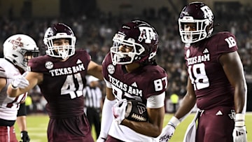 Nov 16, 2024; College Station, Texas, USA; Texas A&M Aggies wide receiver Ashton Bethel-Roman (87) reacts after scoring a touchdown during the fourth quarter against the New Mexico State Aggies at Kyle Field. Mandatory Credit: Maria Lysaker-Imagn Images 