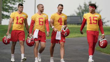 Jul 27, 2022; St. Joseph, MO, USA; Kansas City Chiefs quarterback Dustin Crum (13) and quarterback Bryan Cook (6) and quarterback Chad Henne (4) and quarterback Patrick Mahomes (15) walk down to the field during training camp at Missouri Western State University. Mandatory Credit: Denny Medley-USA TODAY Sports