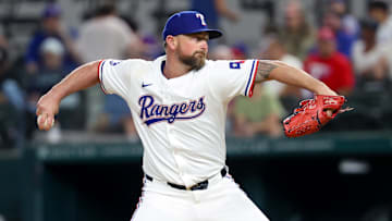 Sep 18, 2024; Arlington, Texas, USA;  Texas Rangers relief pitcher Kirby Yates (39) throws during the ninth inning against the Toronto Blue Jays at Globe Life Field. 