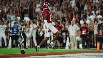 Sep 7, 2024; Tuscaloosa, Alabama, USA; Alabama Crimson Tide wide receiver Kobe Prentice (6) scores a touchdown against the South Florida Bulls during the fourth quarter at Bryant-Denny Stadium. Mandatory Credit: William McLelland-Imagn Images