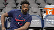 Jan 31, 2025; Charlotte, North Carolina, USA; LA Clippers guard Kobe Brown (21) takes a break during pregame warm ups against the Charlotte Hornets at Spectrum Center. Mandatory Credit: Jim Dedmon-Imagn Images